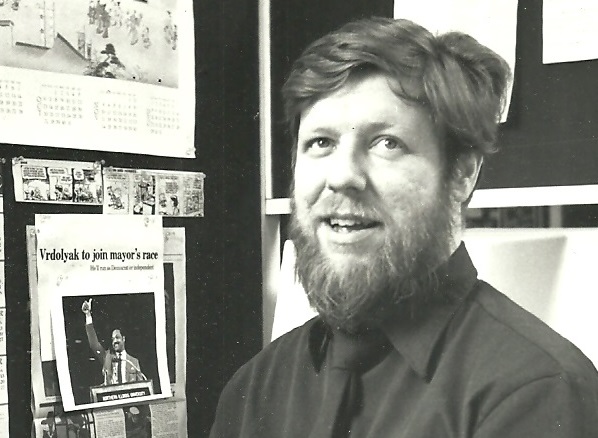 Reardon at Tribune desk in 1980s
