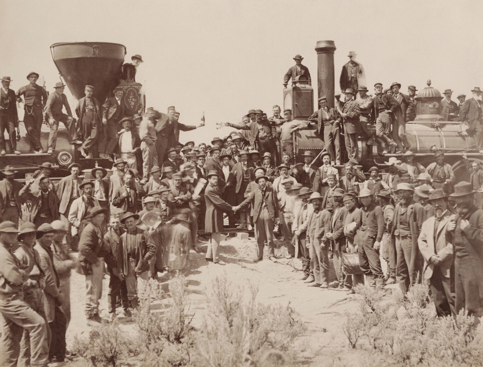 east_and_west_shaking_hands_at_the_laying_of_last_rail_union_pacific_railroad_-_restoration